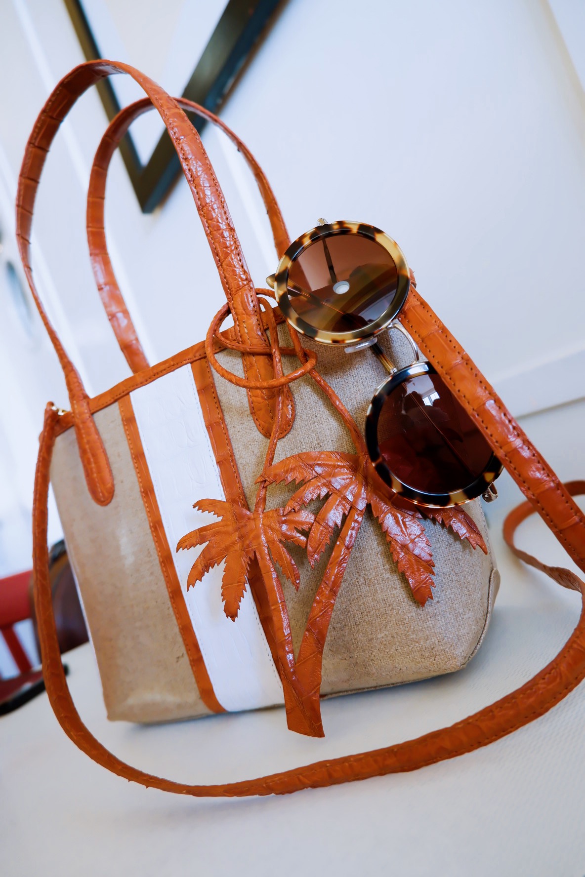 nancy-gonzalez-tina-craig-exotic-skin-crocodile-handbag-palmtree-miu-miu-tortoise-sunglasses